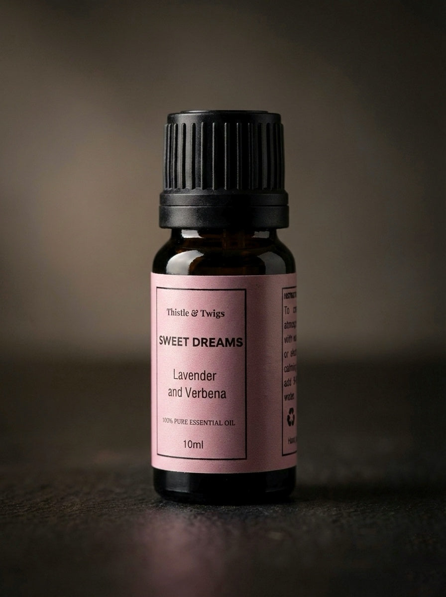 Sweet Dreams Essential Oil bottle by Thistle & Twigs on a dark background