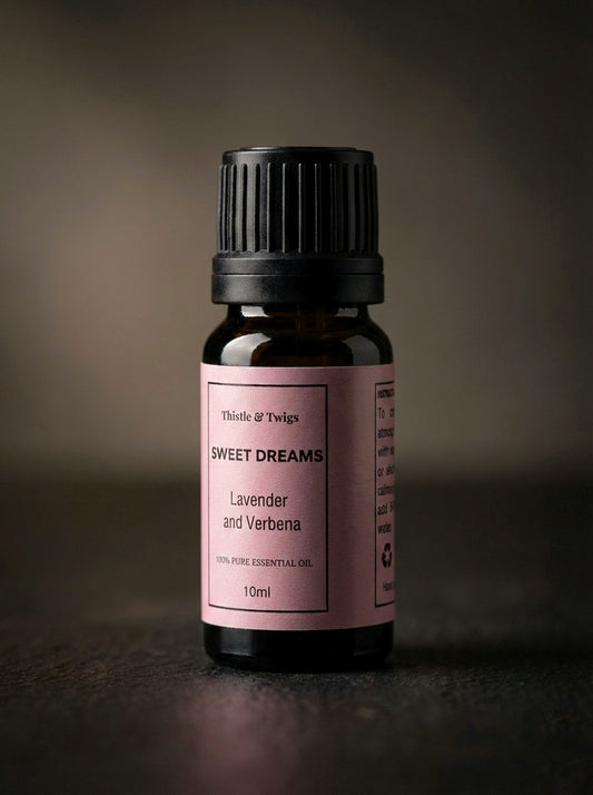Sweet Dreams Essential Oil bottle by Thistle & Twigs on a dark background