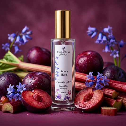 Aurora Bloom Luxury Home Spray 100ml by Thistle & Twigs - rhubarb and plum room mist surrounded by fresh plums, rhubarb stalks and bluebell flowers on a deep plum background, hand poured in Scotland